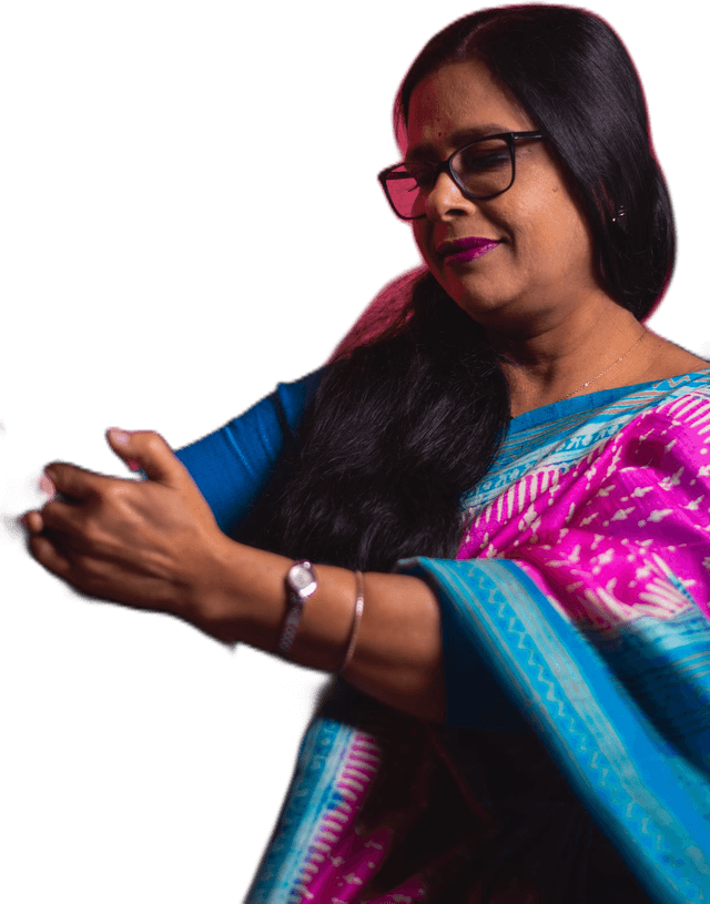 A smiling educator in a saree looking at a new request